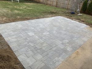 Stamped concrete patio using a random stone stamp pattern