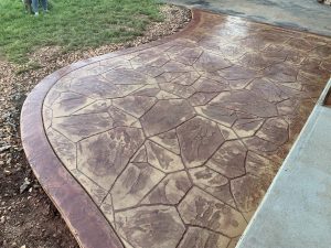 Stamped concrete patio using a fieldstone stamp pattern