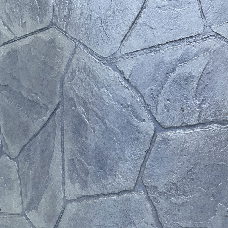 grey stamped concrete flagstone-pattern patio