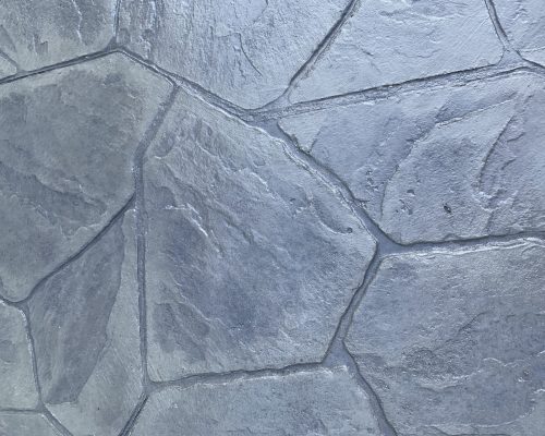 grey stamped concrete flagstone-pattern patio